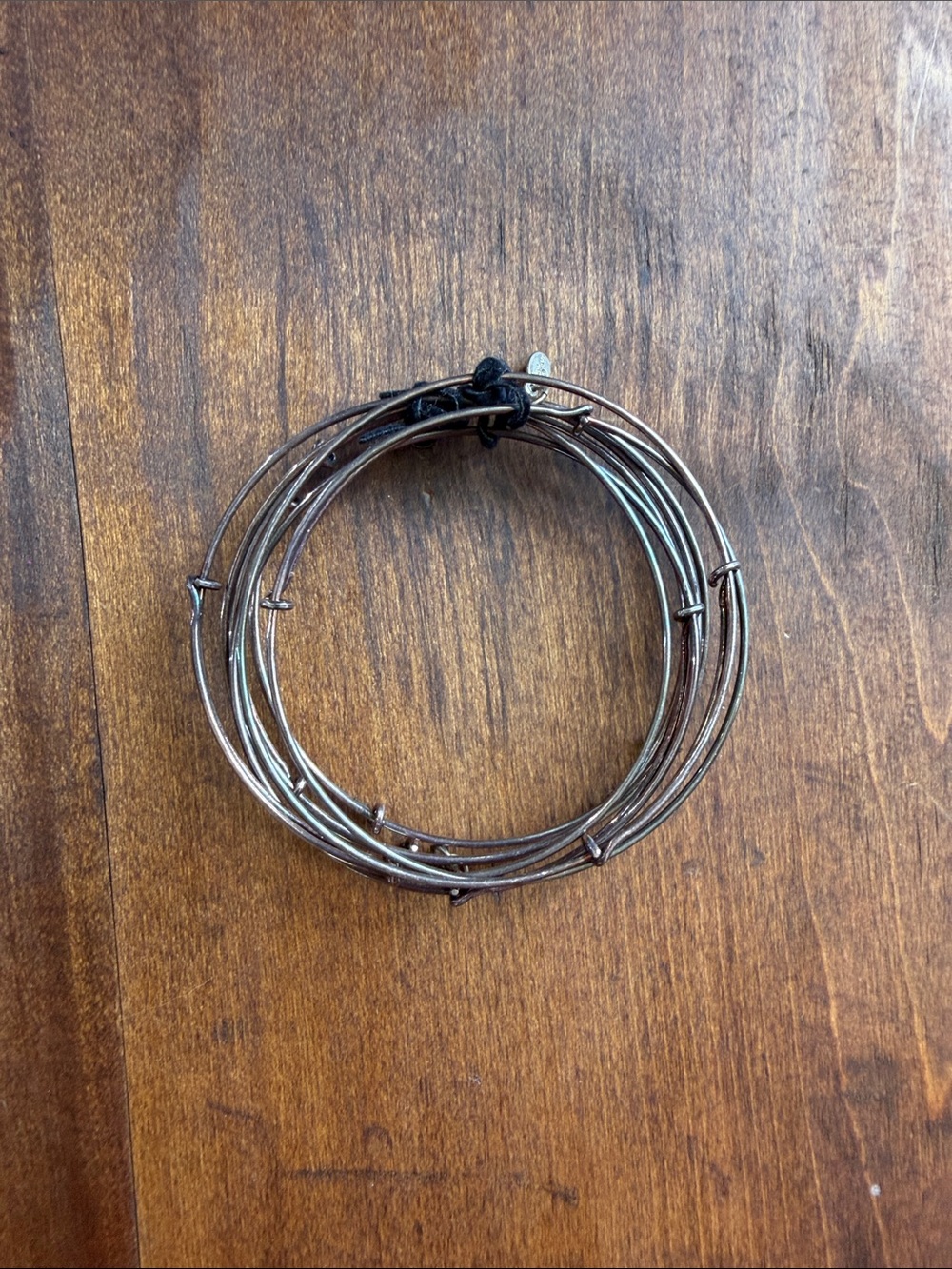 Vintage stack of Alex and Ani expandable wire bangle bracelets